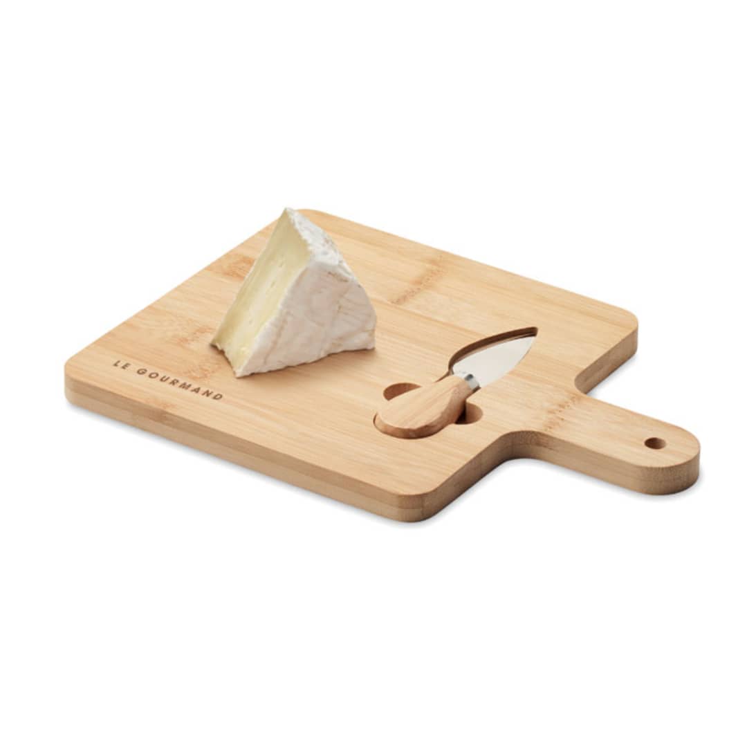 Gadget with logo Cheese board set DARFIELD Bamboo Cheese set serving board with serving knife. Present your guests with some cheese or other types of food and snacks on this woodenplatter. It has a handle for easy carrying. The hole in the handle canbe used to hang the serving board when not in use. Bamboo is a naturalproduct, there may be slight variations in colour and size per item,which can affect the final decoration outcome. Available color: Wood Dimensions: 27.5X19.5X1CM Width: 19.5 cm Length: 27.5 cm Height: 1 cm Volume: 1.8 cdm3 Gross Weight: 0.52 kg Net Weight: 0.44 kg Magnus Business Gifts is your partner for merchandising, gadgets or unique business gifts since 1967. Certified with Ecovadis gold!