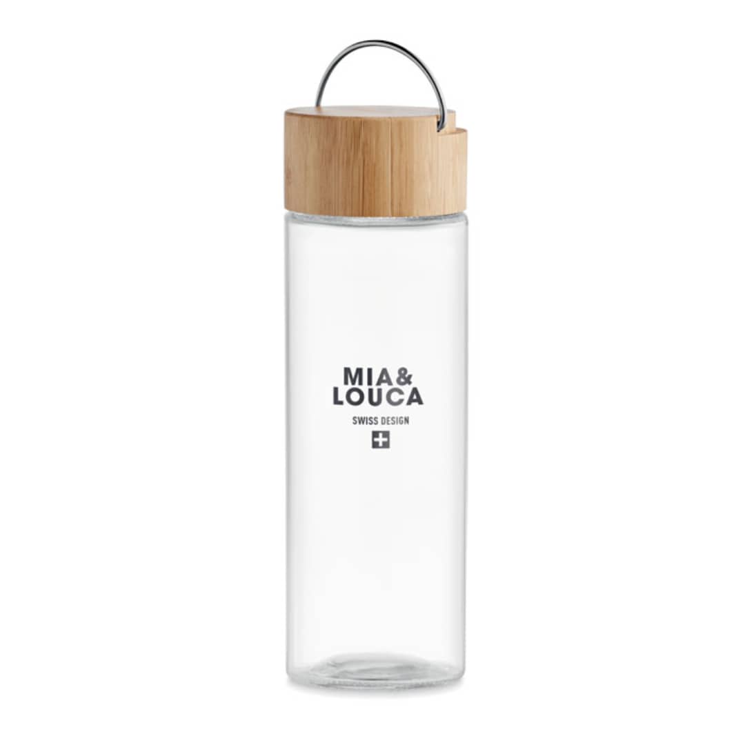 Water bottle with logo AMELAND Glass water bottle with logo with bamboo lid with handle. Capacity: 500 ml. Leak free. Stay hydrated throughout the day and carry this flask with you wherever you go. The handle can be attached to your bag for convenience. The bamboo lid gives the bottle a nice, natural touch. Bamboo is a natural product, there may be slight variations in colour and size per item, which can affect the final decoration outcome. Available color: Transparent Dimensions: Ø6X20.5CM Height: 20.5 cm Diameter: 6.5 cm Volume: 1.24 cdm3 Gross Weight: 0.34 kg Net Weight: 0.307 kg Magnus Business Gifts is your partner for merchandising, gadgets or unique business gifts since 1967. Certified with Ecovadis gold!