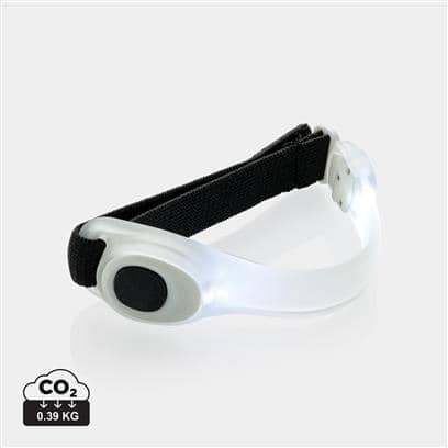 Safety led strap with logo Safety led strap with logo built-in led that can easily be strapped on your arm. The strap makes you more visible during outdoor activities in the dark. Available colors: Black/ White, Red