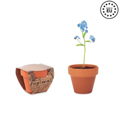 Gadget with logo Terracotta pot FORGET ME NOT Gadget with logo small clay terracotta pot including 'forget me not' seeds. Made in EU. Depending on the surface we can use embroidery, engraving, 360° imprint or screen print.