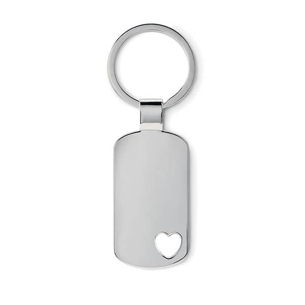 Gadget with logo Key ring CORAZON Metal key ring with logo with heart detail on the bottom. Individually packed in box. Available color: Matt Silver Dimensions: 2,9X5 CM Width: 5 cm Length: 2.9 cm Volume: 0.11 cdm3 Gross Weight: 0.038 kg Net Weight: 0.029 kg Magnus Business Gifts is your partner for merchandising, gadgets or unique business gifts since 1967. Certified with Ecovadis gold!