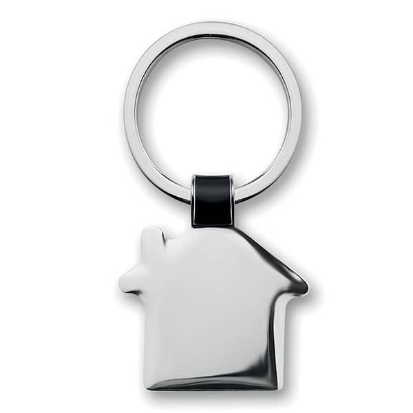 Gadget with logo Key ring HOUSY House shaped metal key ring with logo, shiny nickel finish. Available color: Black Dimensions: 3,7X3X0,2 CM Width: 3 cm Length: 3.7 cm Height: 0.2 cm Volume: 0.148 cdm3 Gross Weight: 0.034 kg Net Weight: 0.018 kg Magnus Business Gifts is your partner for merchandising, gadgets or unique business gifts since 1967. Certified with Ecovadis gold!
