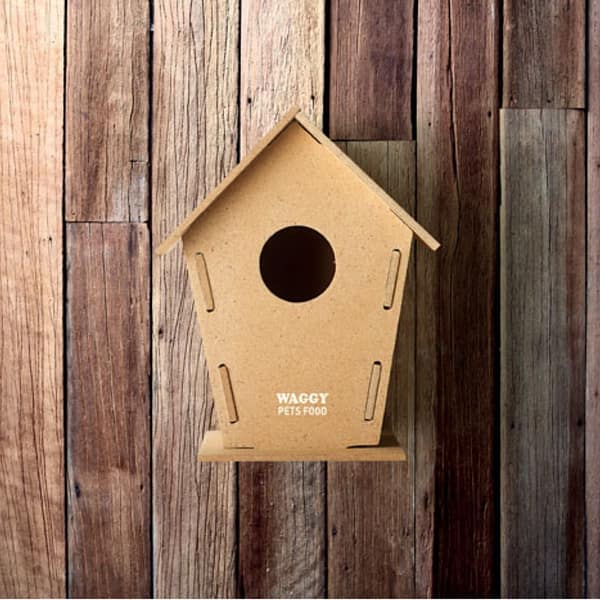 Gadget with logo bird house WOOHOUSE Gadget with logo wooden bird house. Build your own wooden bird house. Made of MDF. Depending on the surface we can use embroidery, engraving, 360° imprint or screen print.