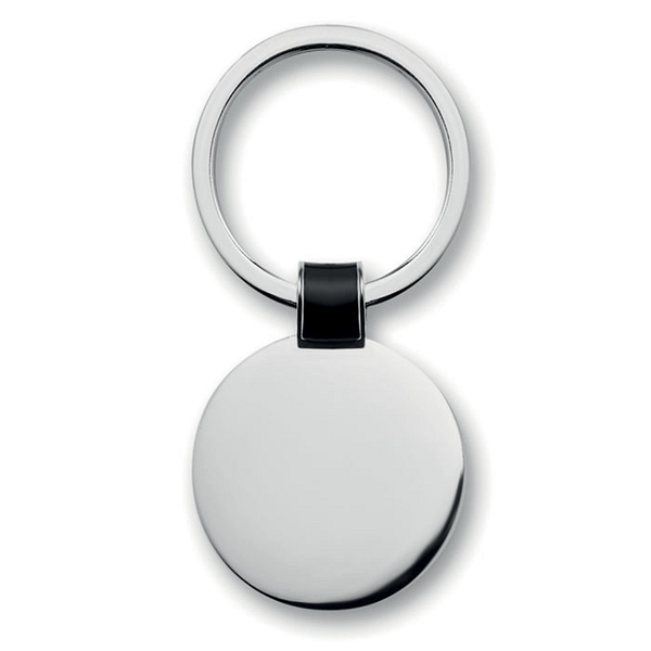 Gadget with logo Key ring Roundy Round shaped metal key ring with logo, shiny nickel finish. Available color: Black, White Dimensions: Ã˜3,3X0,2 CM Height: 0.2 cm Diameter: 3.3 cm Volume: 0.143 cdm3 Gross Weight: 0.026 kg Net Weight: 0.018 kg Magnus Business Gifts is your partner for merchandising, gadgets or unique business gifts since 1967. Certified with Ecovadis gold!