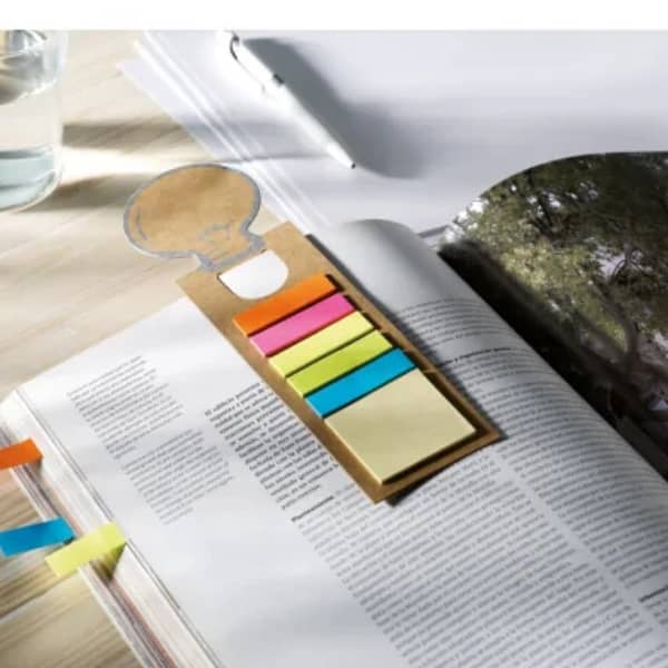 Sticky notes with logo IDEA Meme notes with logo light-bulb bookmark in recycled carton. 2 piece sticky note memo pad. 13 cm ruler. Medium yellow sticky notes pads and 5 assorted colors page markers. Depending on the surface we can use embroidery, engraving, 360° imprint or screen print.