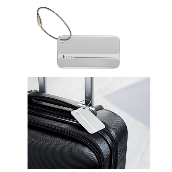 Travel gadget with logo luggage tag TAGGY Travel gadget with logo luggage tag in aluminium. Dimensions: 8X4X0.2CMWidth: 4 cm Length: 8 cm Height: 0.2 cm Depending on the surface we can use embroidery, engraving, 360° imprint or screen print.