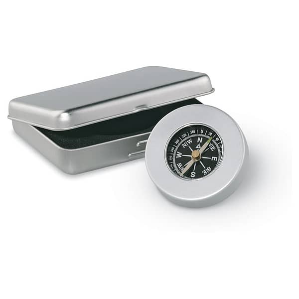Gadget with logo compass TARGET Compass with logo, classic style, nautical in aluminium. Packed in tin box. Depending on the surface we can use embroidery, engraving, 360° imprint or screen print.