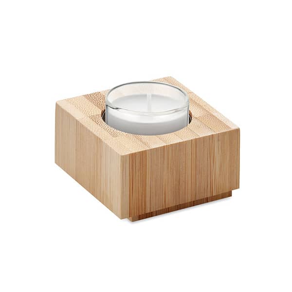 Gadget with logo tealight holder LUXOR Gadget with logo tealight holder in bamboo with tealight included. Depending on the surface we can use embroidery, engraving, 360° imprint or screen print.
