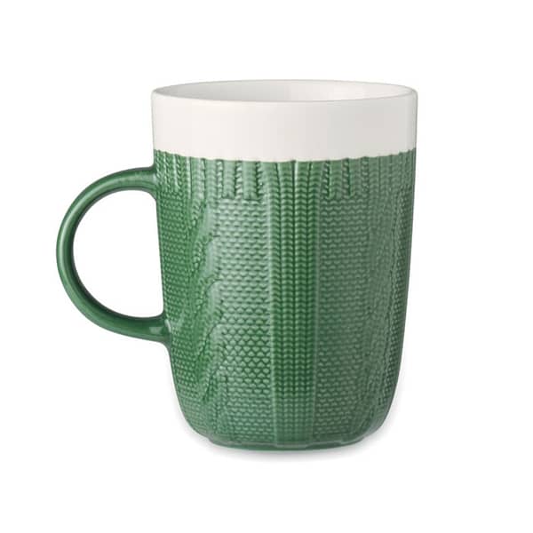 Mug with logo KNITTY Mug with logo made out of ceramic in a knitted design. Volume Capacity 310 ml. Depending on the surface we can use embroidery, engraving, 360° imprint or screen print.