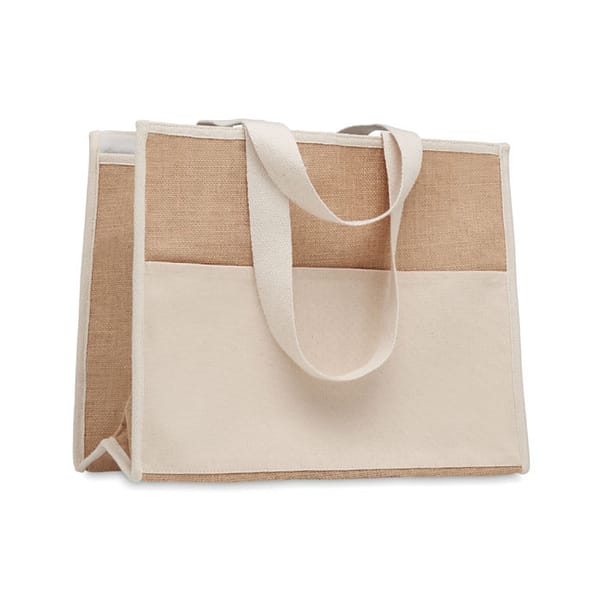Gadget with logo Totebag CAMPO DE GELI Jute shopping and cooler bag with logo with long handles, laminated and with hookand loop closure, front with canvas pocket and cotton webbing. Available color: Beige Dimensions: 43X20X34CM Width: 20 cm Length: 43 cm Height: 34 cm Volume: 2.229 cdm3 Gross Weight: 0.364 kg Net Weight: 0.292 kg Magnus Business Gifts is your partner for merchandising, gadgets or unique business gifts since 1967. Certified with Ecovadis gold!