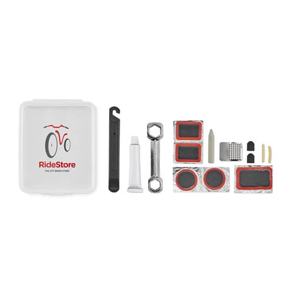 Gadget with logo Bike repair kit REPAIR Bike repair kit with 1 wrench, 2 tyre levers, 1 glue, 2 valve caps, 2 valve tubes, 1 grater, 5 repair patches. Presented in transparent box. With this set you will have everything you need when your bicycle breaks down on you. Get back on your wheels and cycle on! Available color: Transparent Dimensions: 12X9X2,8CM Width: 9 cm Length: 12 cm Height: 2.8 cm Volume: 0.351 cdm3 Gross Weight: 0.083 kg Net Weight: 0.078 kg Magnus Business Gifts is your partner for merchandising, gadgets or unique business gifts since 1967. Certified with Ecovadis gold!