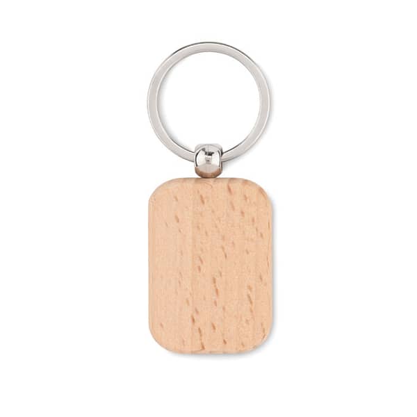 Gadget with logo Key ring POTY WOOD Rectangular shaped wooden key ring. Wood is a natural product, there may be slight variations in colour and size per item, which can affect the final decoration outcome. Available color: Wood Dimensions: 4,5X3X0,7 CM Width: 3 cm Length: 4.5 cm Height: 0.7 cm Volume: 0.06 cdm3 Gross Weight: 0.015 kg Net Weight: 0.011 kg Magnus Business Gifts is your partner for merchandising, gadgets or unique business gifts since 1967. Certified with Ecovadis gold!