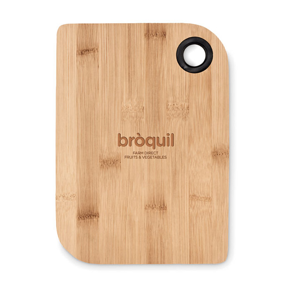 Gadget with logo Cutting board BAYBA CLEAN Cutting board in bamboo wood with hanging hole. This rectangular shaped cutting board with rounded edges on two sides is made from bamboo wood. In the corner is a conveniently placed hole so that you can hang this cutting board in your kitchen when not in use. Available color: Wood Dimensions: 24.5X17.5X1CM Width: 17.5 cm Length: 24.5 cm Height: 1 cm Volume: 0.591 cdm3 Gross Weight: 0.289 kg Net Weight: 0.287 kg Magnus Business Gifts is your partner for merchandising, gadgets or unique business gifts since 1967. Certified with Ecovadis gold!