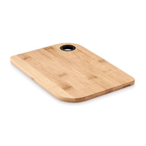 Gadget with logo Cutting board BAYBA CLEAN Cutting board in bamboo wood with hanging hole. This rectangular shaped cutting board with rounded edges on two sides is made from bamboo wood. In the corner is a conveniently placed hole so that you can hang this cutting board in your kitchen when not in use. Available color: Wood Dimensions: 24.5X17.5X1CM Width: 17.5 cm Length: 24.5 cm Height: 1 cm Volume: 0.591 cdm3 Gross Weight: 0.289 kg Net Weight: 0.287 kg Magnus Business Gifts is your partner for merchandising, gadgets or unique business gifts since 1967. Certified with Ecovadis gold!