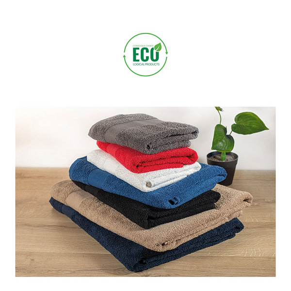 Towel with logo MERRY Towel with logo made of 100% 360 gsm organic cotton. Dimensions 180x100 cm. Terry material is soft and absorbent. Made from organic cotton produced under a certified label. Depending on the surface we can use embroidery, engraving, 360° imprint or screen print.