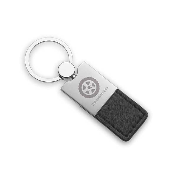 Key ring with logo COLUMBUS Key ring with logo in metal with PU leather. Available color: Black Dimensions: 9X3,1X0,6 CM Width: 3.1 cm Length: 9 cm Height: 0.6 cm Volume: 0.11 cdm3 Gross Weight: 0.036 kg Net Weight: 0.027 kg Material in Product: Virgin Plastic Depending on the surface we can use embroidery, engraving, 360° imprint or screen print.