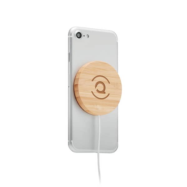 Wireless charger with logo RUNDO MAG Wireless charger with logo made out of magnetic bamboo. Output: DC 9V/1.1A (10W) for quick charging. Compatible with iPhone® 12 and newer. Including additional magnetic metal ring to support charging of other non-magnetic wireless chargeable phones. Available color: Wood Dimensions: Ø6X0,8 CM Height: 0.8 cm Diameter: 6 cm Volume: 0.16 cdm3 Gross Weight: 0.07 kg Net Weight: 0.044 kg Depending on the surface we can use embroidery, engraving, 360° imprint or screen print.