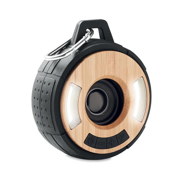 Audio gadget with logo Bluetooth speaker CLEVELAND Audio gadget with logo, Bluetooth speaker 5.0 in Bamboo and ABS, with 2 front COB lights, IPX4 splash waterproof and carabiner. 1 Rechargeable Li-Ion 500 mAh battery. Output data: 3W, 4 Ohm. Playing time approx. 2h. Available color: Black Dimensions: Ø9,6X4,4 CM Height: 4.4 cm Diameter: 9.6 cm Volume: 0.7 cdm3 Gross Weight: 0.29 kg Net Weight: 0.28 kg Depending on the surface we can use embroidery, engraving, 360° imprint or screen print.