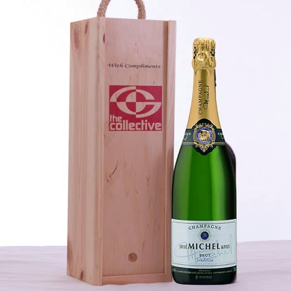 Champagne and crate with logo Surprise your employees and customers with an exclusive Champagne package with your logo. Logo and message can be printed on bottle and capsule. Minimum order quantity. Depending on the surface we can use embroidery, engraving, 360Â° imprint or screen print. Magnus Business Gifts anticipated on what society expects today: focus on corporate social responsibility. Combined with our top service, if required, without extra service for low budget solutions. Magnus Business Gifts is your partner for merchandising, gadgets or unique business gifts since 1967. Certified with Ecovadis gold 2022!