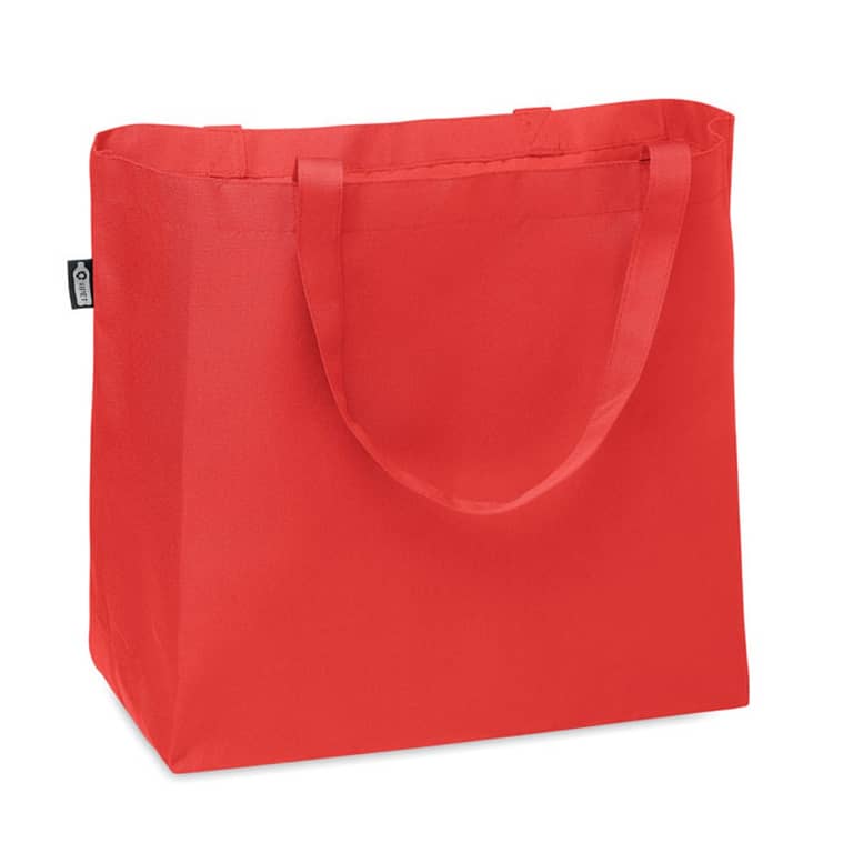 Tote bag with logo FAMA Tote bag with logo in RPET  with long handles and bottom gusset. Large shopping bag or beach bag in 600D RPET. Depending on the surface we can use embroidery, engraving, 360° imprint or screen print.