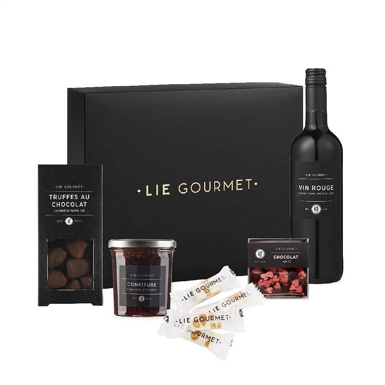 Gift box Biscuits & Wine Beautiful gift filled withÂ Truffles, jam, nougat, chocolate & red wine. Color: Black - Material: Paper Dimensions: 27x32x8 CM - Package: EAN Sticker Magnus Business Gifts is your partner for merchandising, gadgets or unique business gifts since 1967. Certified with Ecovadis gold!