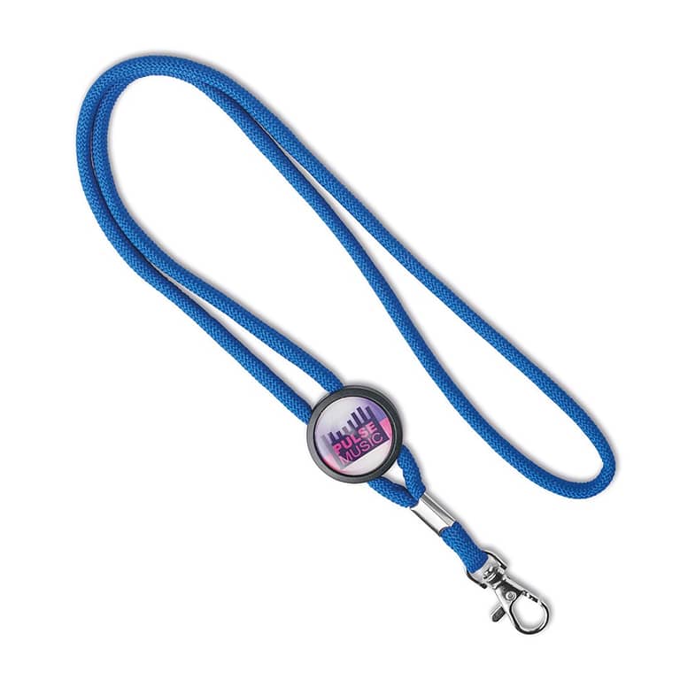 Key cord with domed slider Polyester cord lanyard with a full colour domed slider and a metal carabiner or choose from one of the other clip options. The slider comes standard in black but with the right quantity it can be produced in your wished colour as well. The cord is ca. 90cm long. Magnus Business Gifts is your partner for merchandising, gadgets or unique business gifts since 1967. Certified with Ecovadis gold!