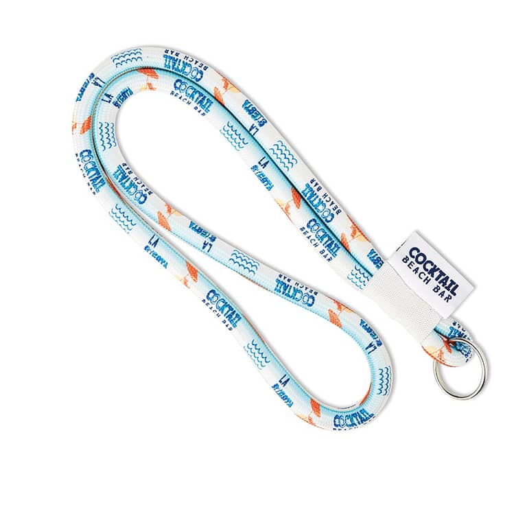Key cord with woven labelÂ  Polyester cord lanyard with a 4 colour woven label and a metal carabiner or choose from one of the other clip options. The ca. 90cm white cord is printed with a full colour sublimation and is suitable for repeated designs as the logo positioning can not be determined exactly. Magnus Business Gifts is your partner for merchandising, gadgets or unique business gifts since 1967. Certified with Ecovadis gold!