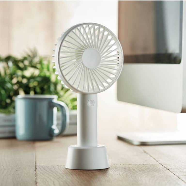 Gadget with logo USB desk fan DINI Gadget with logo small portable fan with additional stand to use as desk fan. 3 speed-settings. USB port rechargeable battery 2000 mA . Depending on the surface we can use embroidery, engraving, 360Â° imprint or screen print.