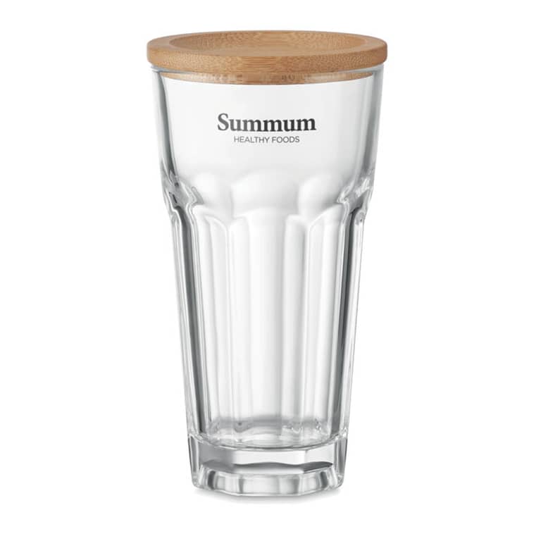 Tumbler with logo SEMPRE Re-usable Glass tumbler with bamboo lid that can also be used as coaster. Capacity: 300 ml. Available color: Transparent Dimensions: Ø7,7X14,2 CM Height: 14.2 cm Diameter: 7.7 cm Volume: 1.3 cdm3 Gross Weight: 0.41 kg Net Weight: 0.361 kg Magnus Business Gifts is your partner for merchandising, gadgets or unique business gifts since 1967. Certified with Ecovadis gold!
