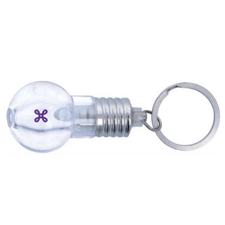 Gadget with logo Key ring ILUMIX Light bulb key ring with white LED light. 3 cell batteries included. Each in a gift box.  Available color: Transparent Dimensions: 9X3X2,9 CM Width: 3 cm Length: 9 cm Height: 2.9 cm Volume: 0.111 cdm3 Gross Weight: 0.028 kg Net Weight: 0.02 kg Magnus Business Gifts is your partner for merchandising, gadgets or unique business gifts since 1967. Certified with Ecovadis gold!