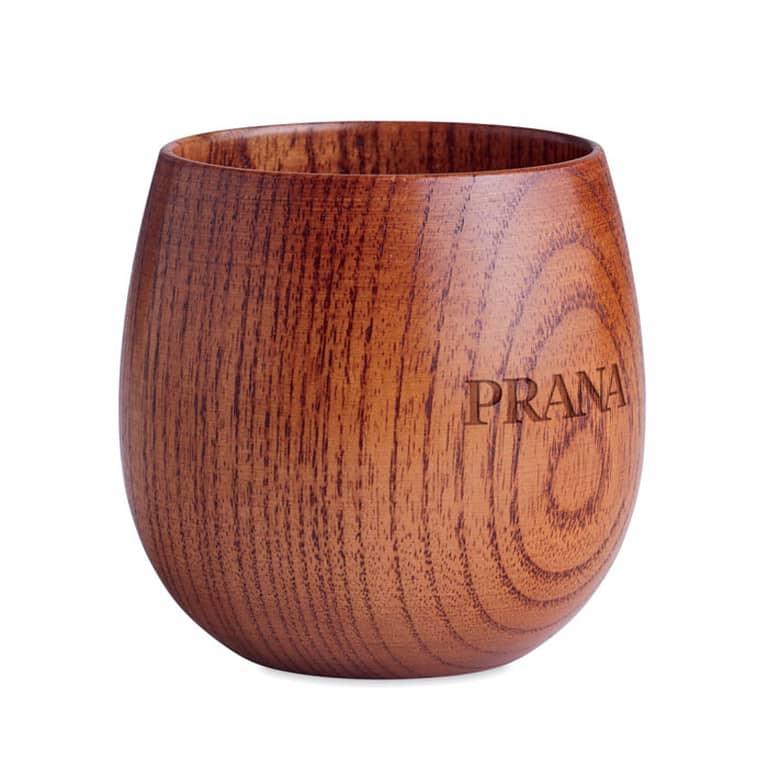 Mug with logo OVALIS Full oak wooden mug with logo. Capacity 250 ml. Drink your favourite coffee, tea or hot chocolate from this beautiful natural mug made from oak wood. This mug is definitely an eye catcher with its unique wooden look. Oak wood is a natural product, there may be slight variations in colour and size per item, which can affect the final decoration outcome. Produced from a sustainable source. Available color: Wood Dimensions: Ø7X7.5CM Height: 7.5 cm Diameter: 7 cm Volume: 0.825 cdm3 Gross Weight: 0.115 kg Net Weight: 0.103 kg Magnus Business Gifts is your partner for merchandising, gadgets or unique business gifts since 1967. Certified with Ecovadis gold!