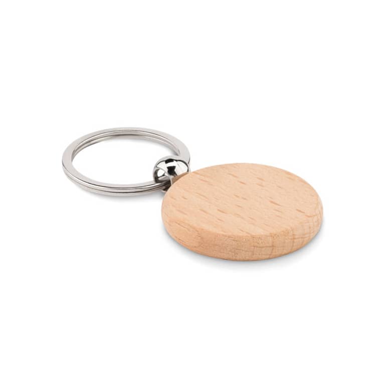 Gadget with logo Key ring TOTY WOOD Round shaped wooden key ring. Wood is a natural product, there may be slight variations in colour and size per item, which can affect the final decoration outcome. Available color: Wood Dimensions: Ø4X0,7 CM Height: 0.7 cm Diameter: 4 cm Volume: 0.086 cdm3 Gross Weight: 0.015 kg Net Weight: 0.011 kg Magnus Business Gifts is your partner for merchandising, gadgets or unique business gifts since 1967. Certified with Ecovadis gold!