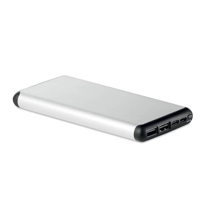 Powerbank with logo wireless SIUR POWER Powerbank with logo with 10000 mAh in aluminium case with suction cups for ease of use whilst travelling. Includes wireless output 2A for quick charging, with power delivery (PD) support to charge the newest laptop MacProÂ®. Available color: Matt Silver Dimensions: 14,4X6,8X1,5 CM Width: 7 cm Length: 14.5 cm Height: 1.4 cm Volume: 0.575 cdm3 Gross Weight: 0.291 kg Net Weight: 0.248 kg Depending on the surface we can use embroidery, engraving, 360Â° imprint or screen print.