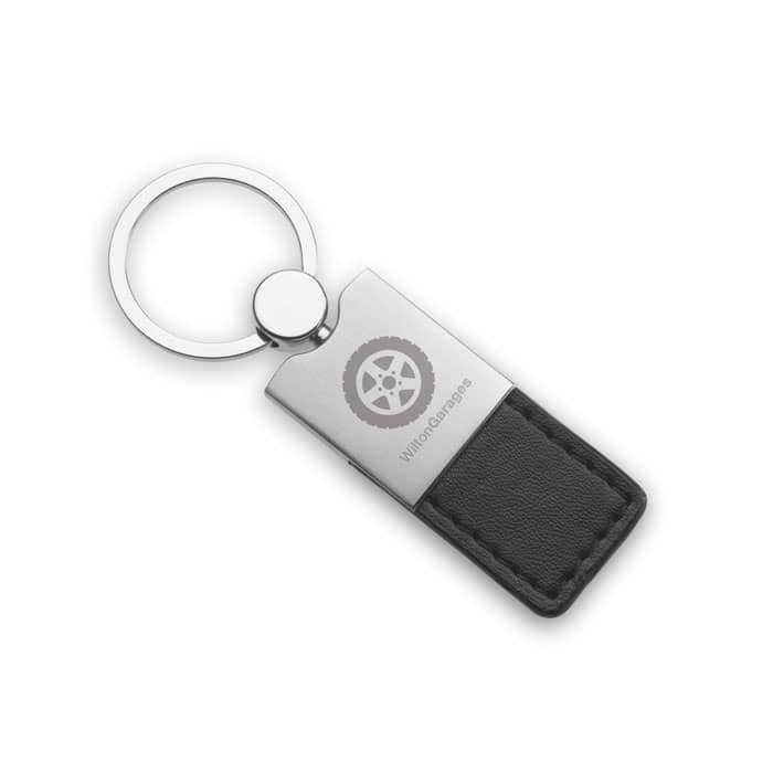 Key ring with logo COLUMBUS Key ring with logo in metal with PU leather. Available color: Black Dimensions: 9X3,1X0,6 CM Width: 3.1 cm Length: 9 cm Height: 0.6 cm Volume: 0.11 cdm3 Gross Weight: 0.036 kg Net Weight: 0.027 kg Material in Product: Virgin Plastic Depending on the surface we can use embroidery, engraving, 360Â° imprint or screen print.