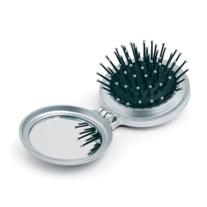 Gadget with logo hair brush B BEAUTY. Foldable hair brush with logo and mirror in plastic housing. Comes in silver spray finish. We use different printing techniques to add your logo. Depending on the surface we can use embroidery, engraving, 360° imprint or screenprint.