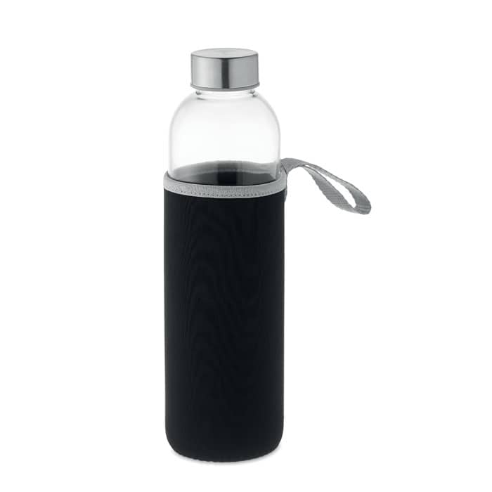 Water bottle with logo UTAH LARGE Water bottle with logo with neoprene pouch in Glass. Not suitable for carbonated drinks.  Capacity: 750ml. Leak free. This large capacity bottle will help you stay hydrated throughout the day. The neoprene pouch makes it easy to hold and gives extra personalisation options. Available color: Black Dimensions: Ø6.5X25CM Height: 25 cm Diameter: 6.5 cm Volume: 1.9 cdm3 Gross Weight: 0.4 kg Net Weight: 0.336 kg Magnus Business Gifts is your partner for merchandising, gadgets or unique business gifts since 1967. Certified with Ecovadis gold!