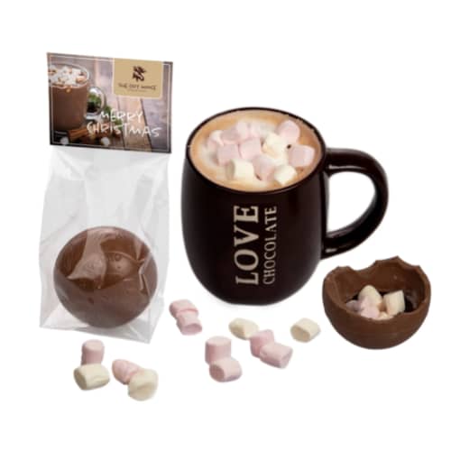 Chocolate with logo Hot ball Ball filled with cocoa powder and mini marshmallows. All you have to do is place the choco ball in your mug and pour the hot milk over it. Then it pops open and you have a complete, divine chocolate milk within 30 seconds! 1 milk-chocolate ball filled with cocoa powder and mini marshmallows. Available color: Transparent Magnus Business Gifts is your partner for merchandising, gadgets or unique business gifts since 1967. Certified with Ecovadis gold!